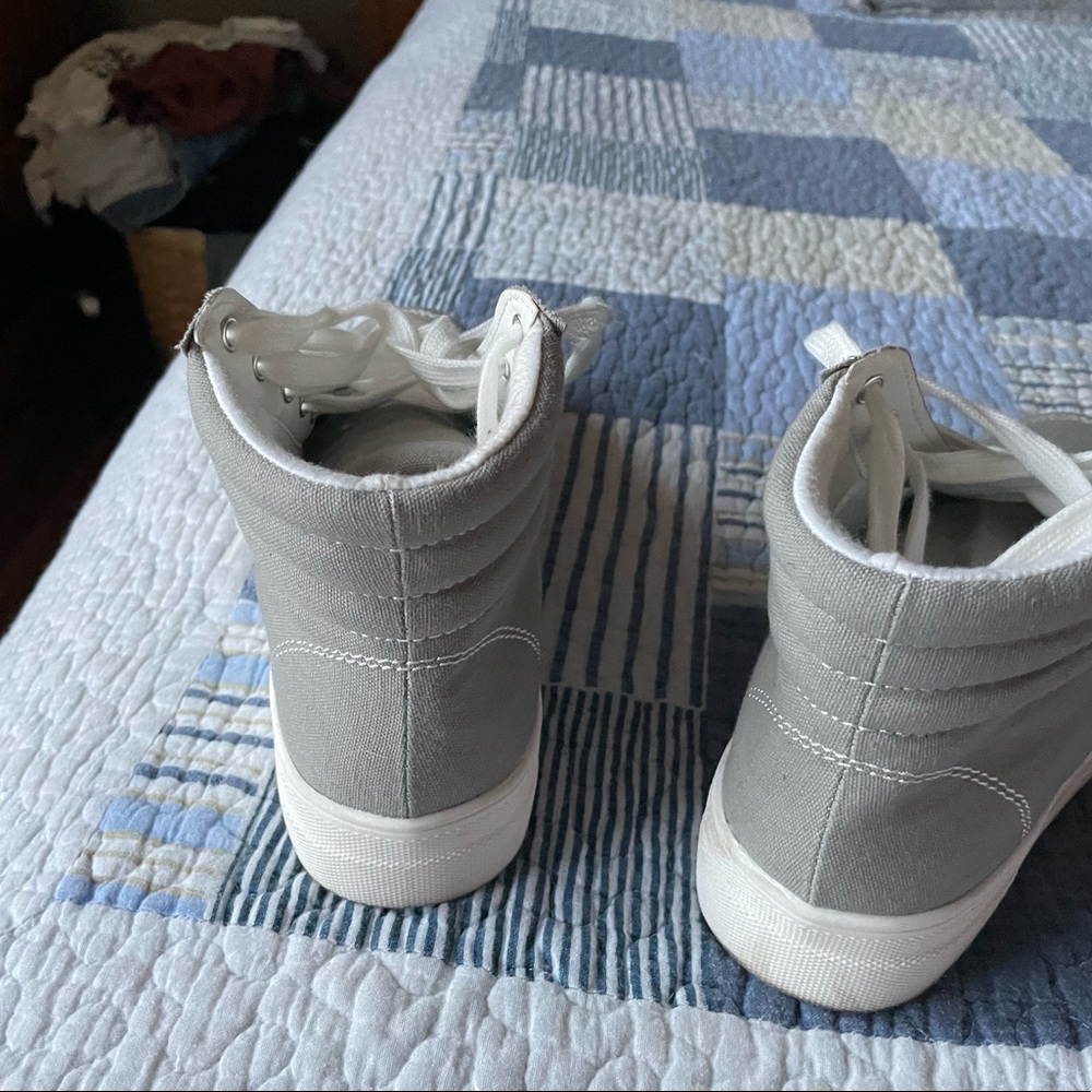 Size 8 gray high tops. Worn one time.